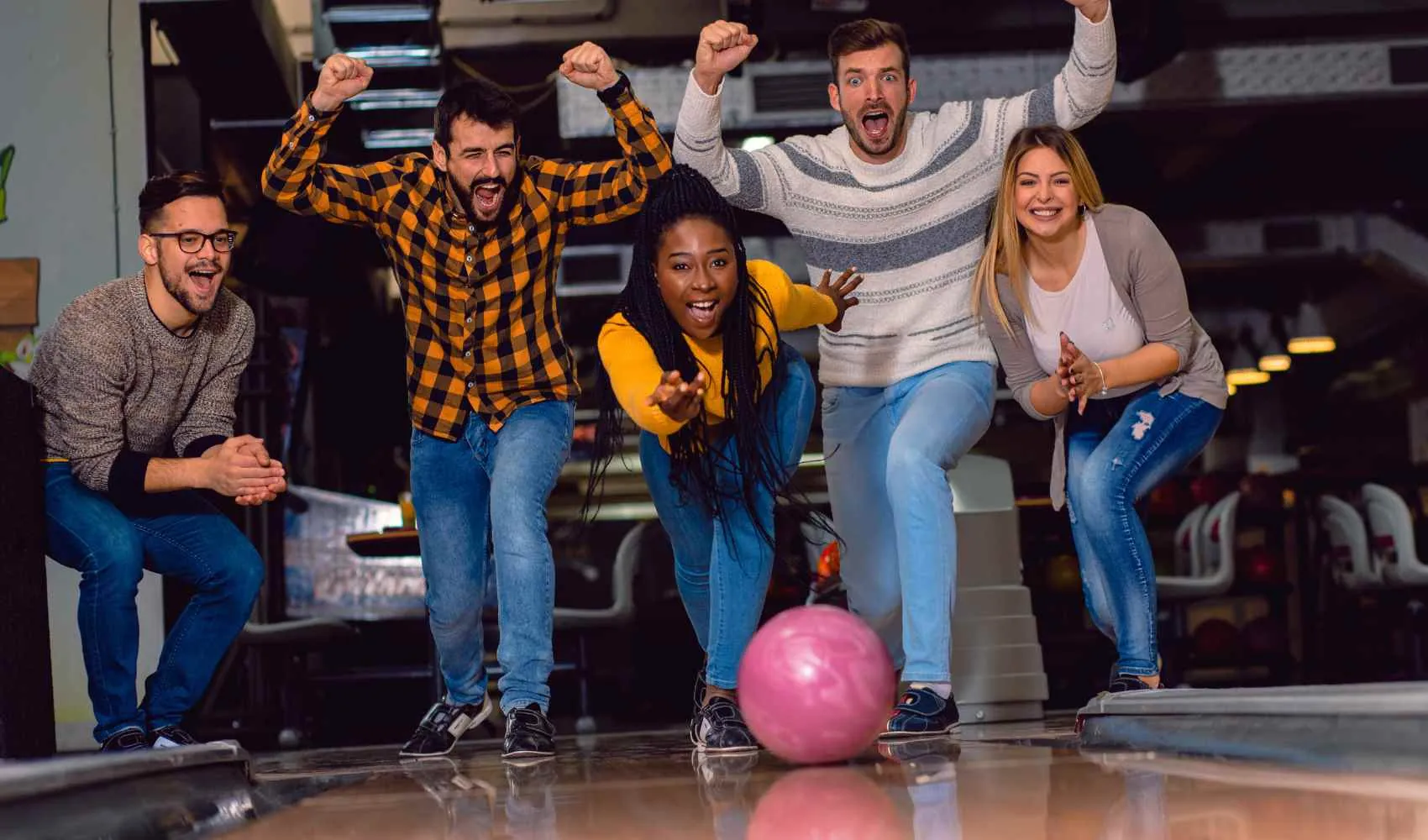 Bowling lanes lit for an evening session